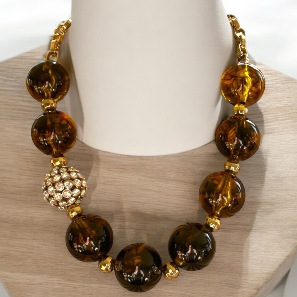 Amber colored lucite necklace,with rhinestones, matching pierced dangle earrings